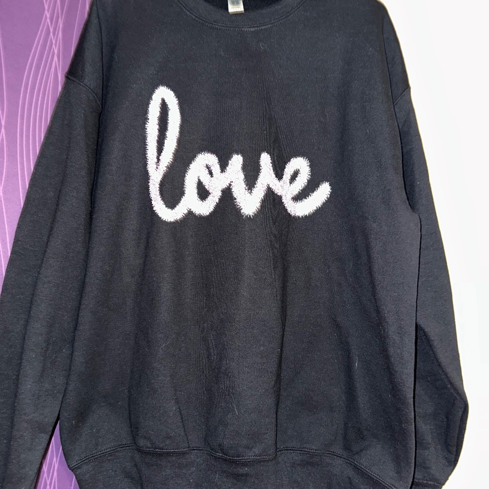 Love sweatshirt brand new never worn